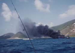 Fire and subsequent sunken vessel investigation